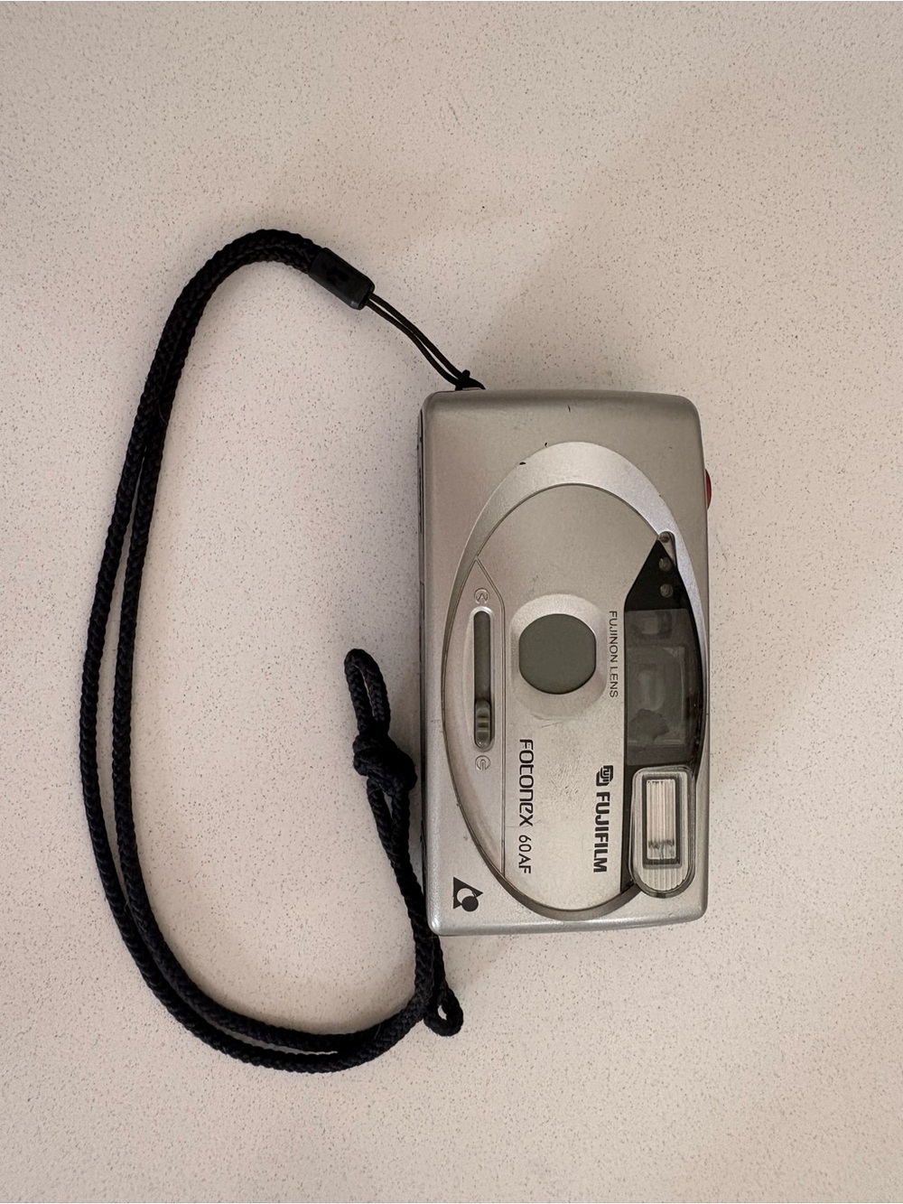 Fujifilm Silver Compact Film Camera with Black Wrist Strap